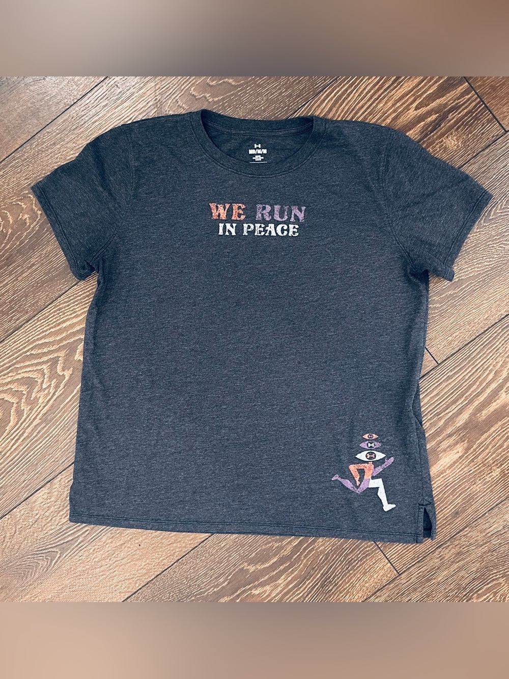 Under Armour Women’s We Run in Peace' Charcoal Graphic Tee